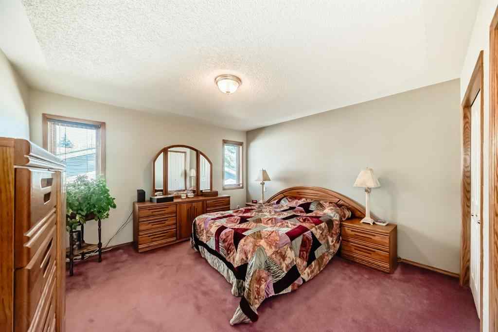 MLS® A2264522 - 152 Quigley Drive  in West Terrace Cochrane, Residential