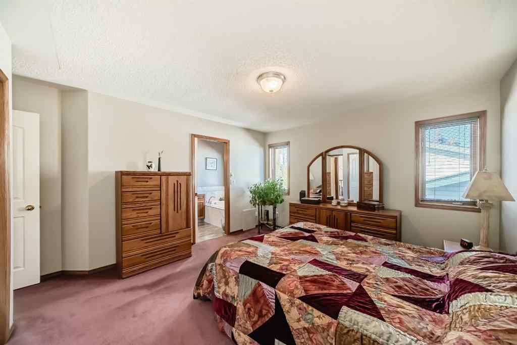 MLS® A2264522 - 152 Quigley Drive  in West Terrace Cochrane, Residential