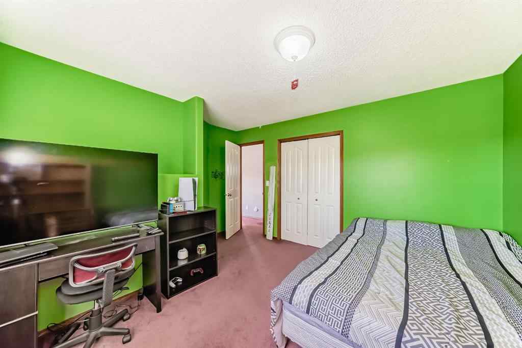 MLS® A2264522 - 152 Quigley Drive  in West Terrace Cochrane, Residential