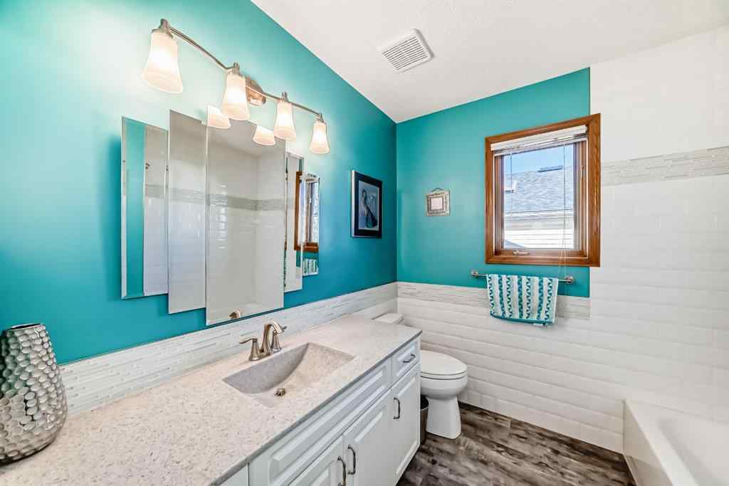 MLS® A2264522 - 152 Quigley Drive  in West Terrace Cochrane, Residential