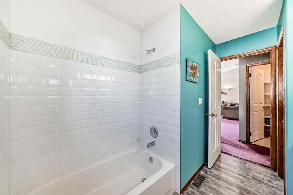 MLS® A2264522 - 152 Quigley Drive  in West Terrace Cochrane, Residential