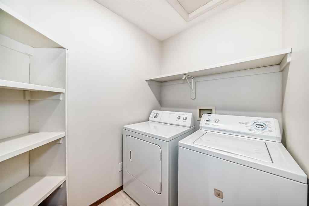 MLS® A2264522 - 152 Quigley Drive  in West Terrace Cochrane, Residential