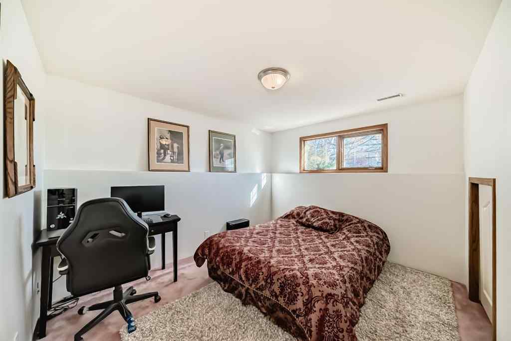 MLS® A2264522 - 152 Quigley Drive  in West Terrace Cochrane, Residential