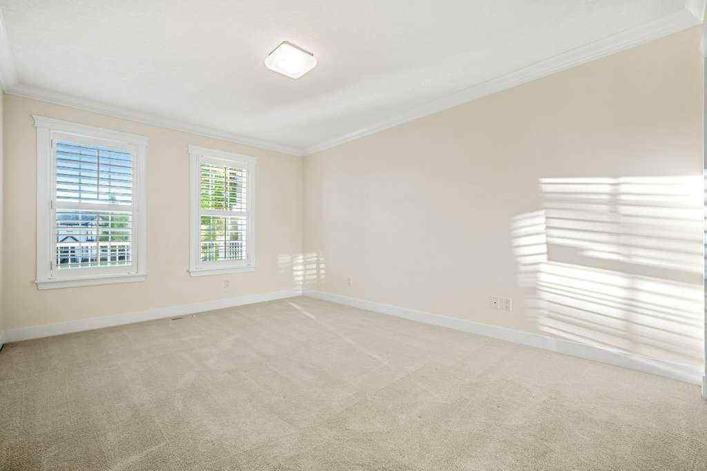 MLS® A2264532 - 24 Ypres Mews SW in Garrison Woods Calgary, Residential