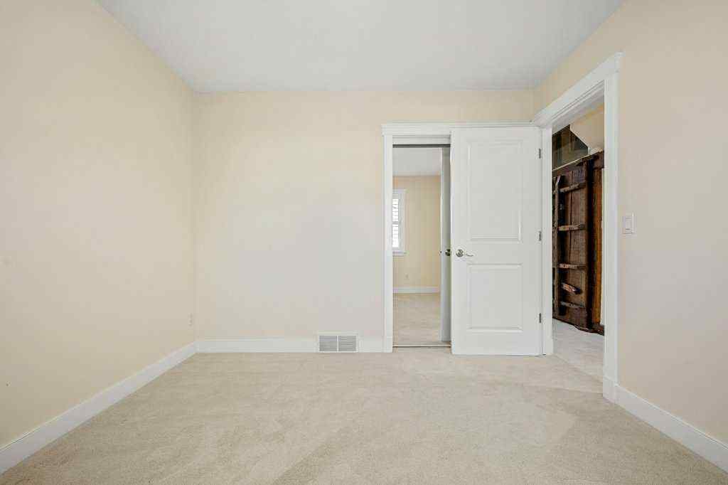 MLS® A2264532 - 24 Ypres Mews SW in Garrison Woods Calgary, Residential