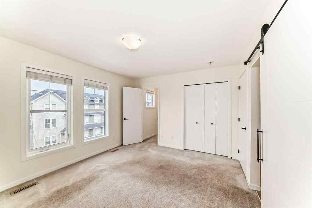 MLS® A2264535 - 203 South Point Park SW in South Point Airdrie, Residential