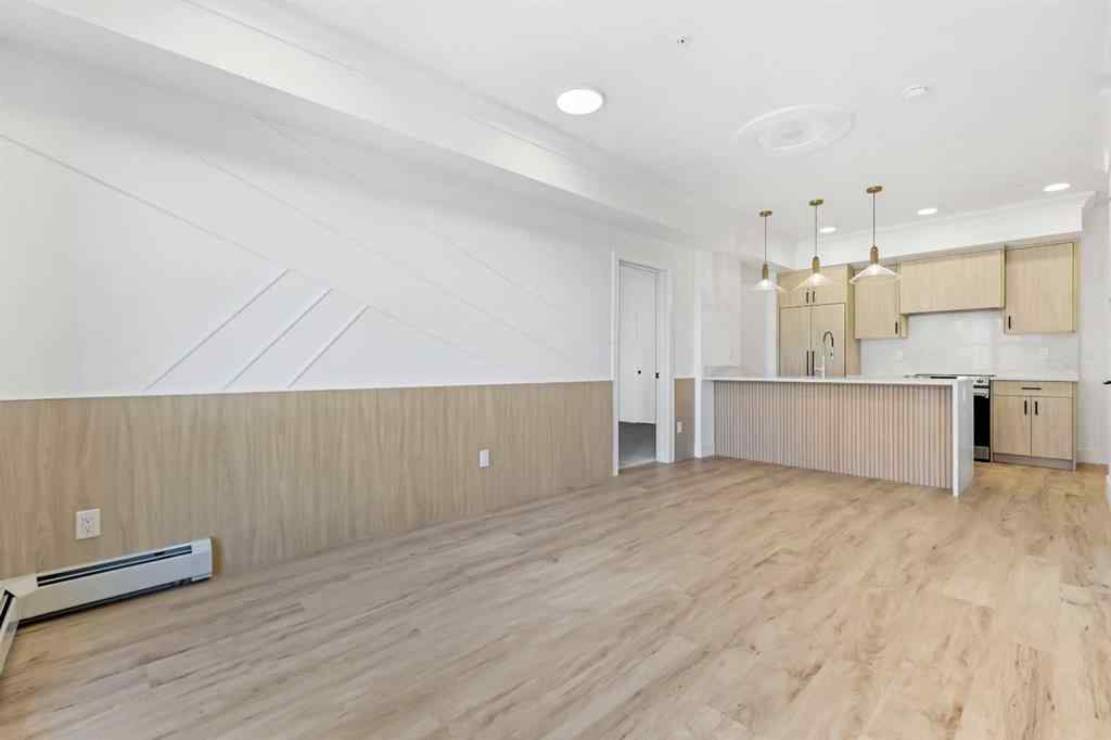 MLS® A2264545 - Unit #313 370 Dieppe Drive SW in Currie Barracks Calgary, Residential