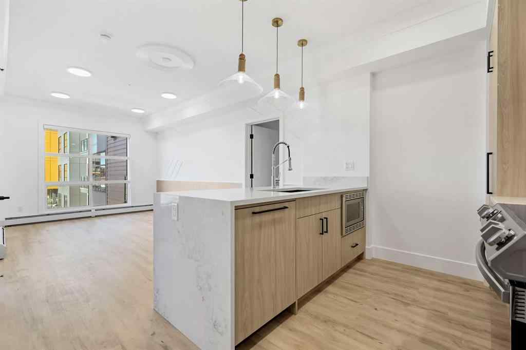 MLS® A2264545 - Unit #313 370 Dieppe Drive SW in Currie Barracks Calgary, Residential