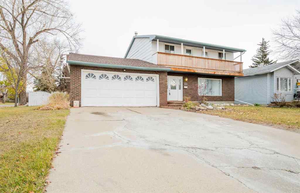 MLS® A2264563 - 10132 93 Avenue  in Swanavon Grande Prairie, Residential