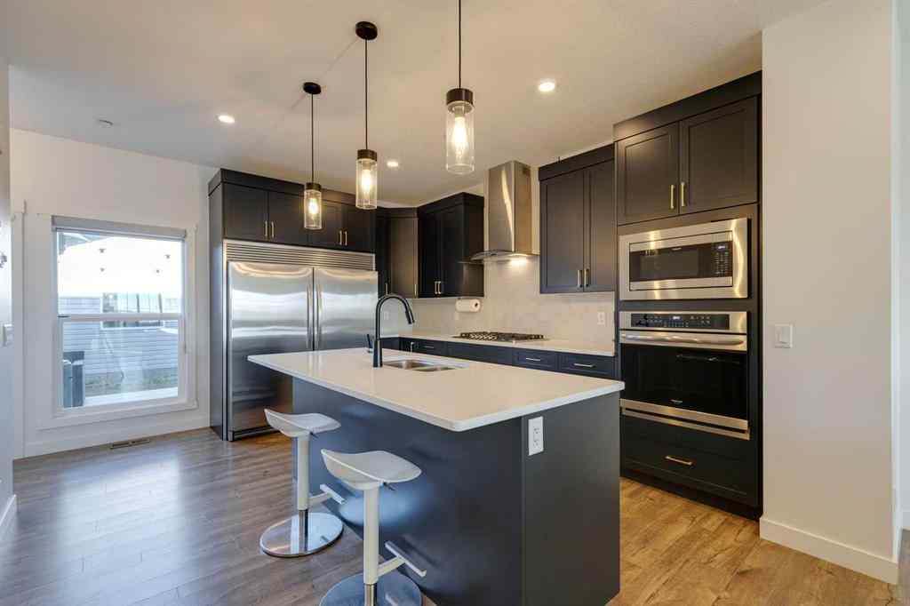 MLS® A2264566 - 14965 1 Street NW in Livingston Calgary, Residential