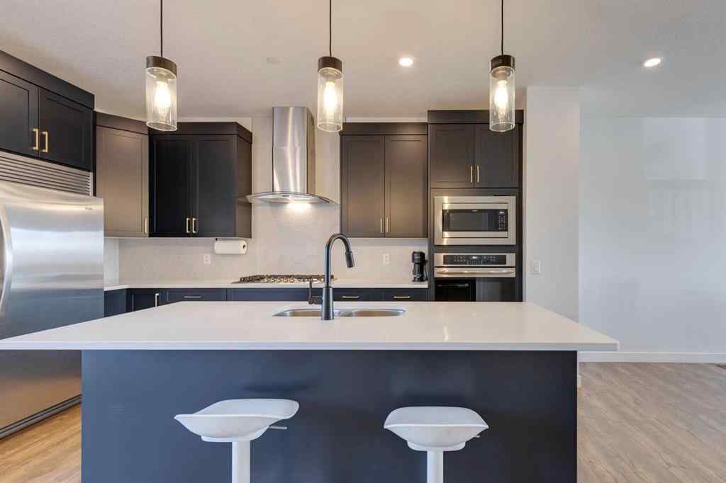 MLS® A2264566 - 14965 1 Street NW in Livingston Calgary, Residential