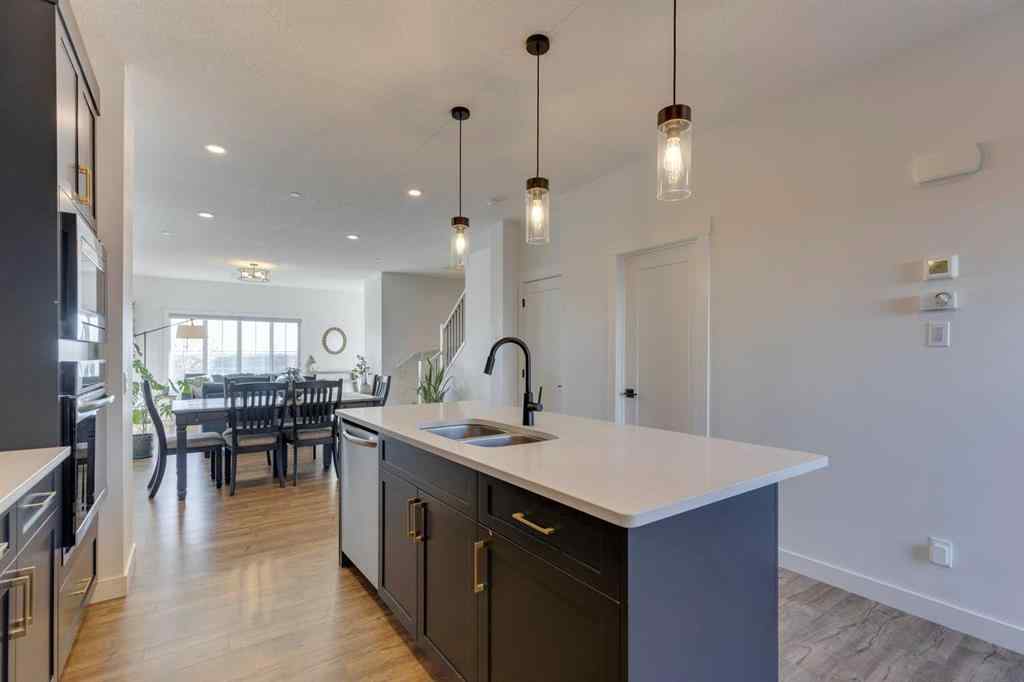 MLS® A2264566 - 14965 1 Street NW in Livingston Calgary, Residential