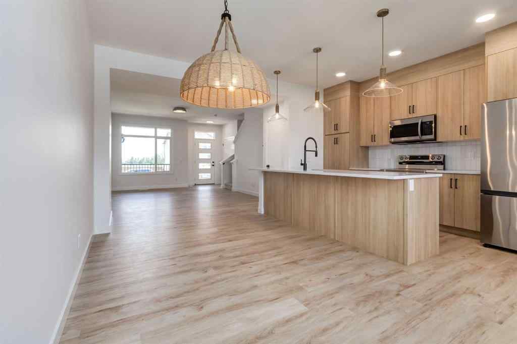 MLS® A2264576 - 403 Clydesdale Avenue  in Heartland Cochrane, Residential