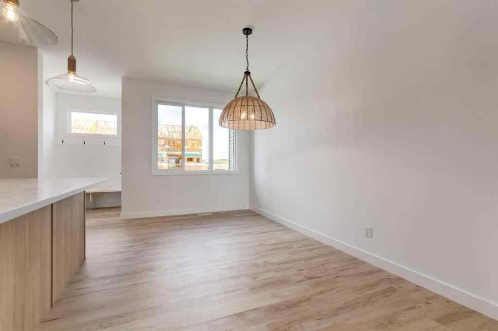 MLS® A2264576 - 403 Clydesdale Avenue  in Heartland Cochrane, Residential