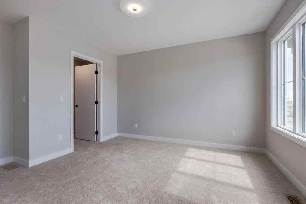 MLS® A2264579 - 405 Clydesdale Avenue  in Heartland Cochrane, Residential