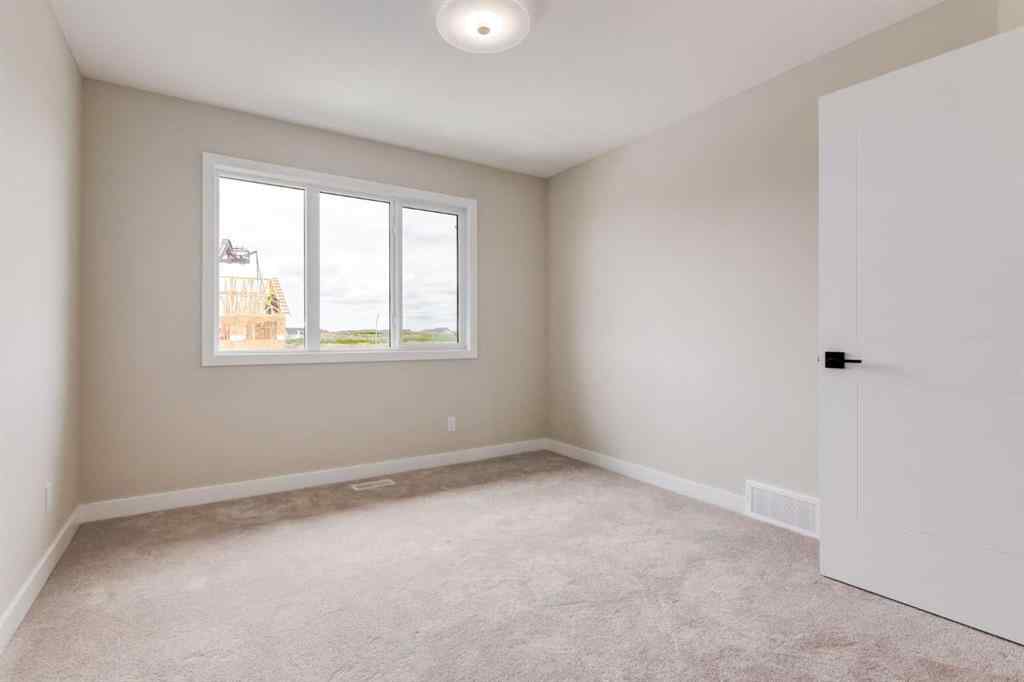 MLS® A2264580 - 82 Agate Road  in Greystone Cochrane, Residential