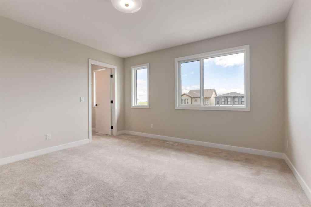 MLS® A2264580 - 82 Agate Road  in Greystone Cochrane, Residential