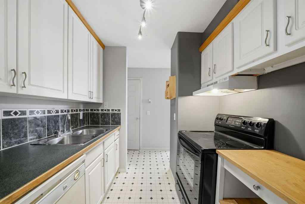 MLS® A2264585 - Unit #102 5519 Kerry Wood Drive  in Riverside Meadows Red Deer, Residential