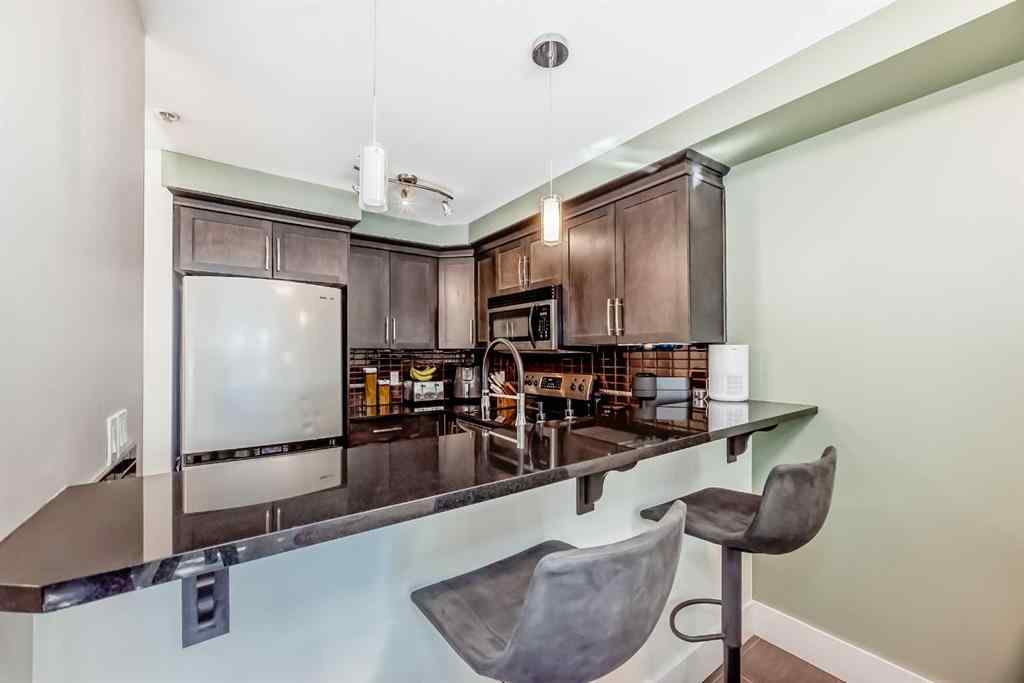 MLS® A2264589 - Unit #104 725 4 Street NE in Renfrew Calgary, Residential