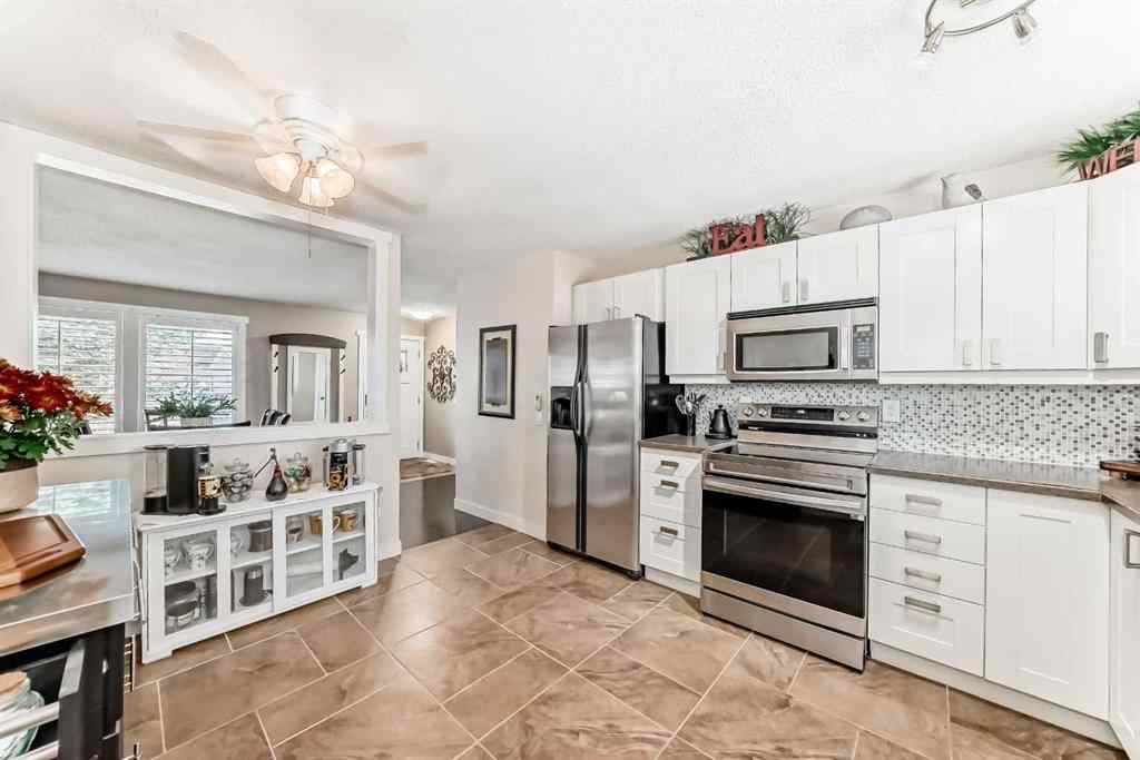 MLS® A2264590 - 67 Sandstone Crescent SE in Summerhill Airdrie, Residential