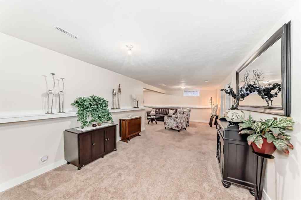 MLS® A2264590 - 67 Sandstone Crescent SE in Summerhill Airdrie, Residential