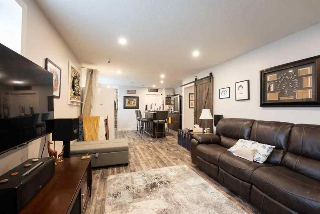 MLS® A2264593 - Unit #4 59 Aquitania Circle W in The Crossings Lethbridge, Residential