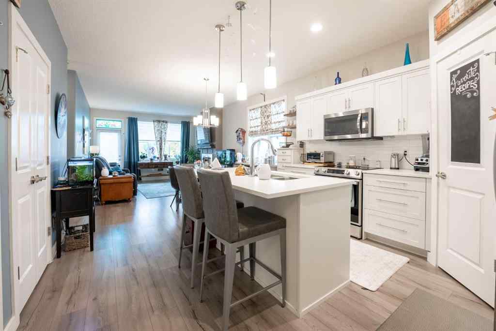 MLS® A2264593 - Unit #4 59 Aquitania Circle W in The Crossings Lethbridge, Residential