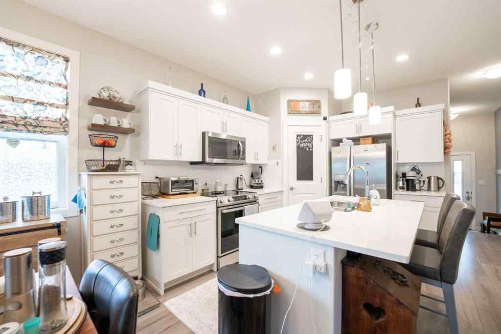 MLS® A2264593 - Unit #4 59 Aquitania Circle W in The Crossings Lethbridge, Residential