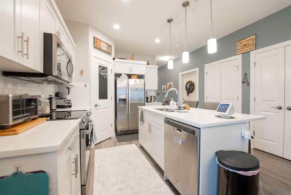 MLS® A2264593 - Unit #4 59 Aquitania Circle W in The Crossings Lethbridge, Residential