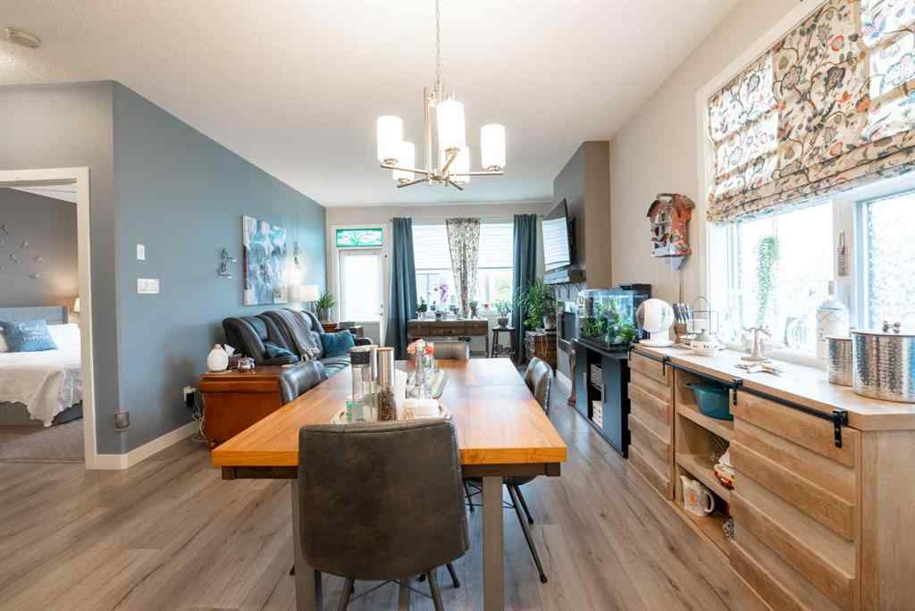 MLS® A2264593 - Unit #4 59 Aquitania Circle W in The Crossings Lethbridge, Residential