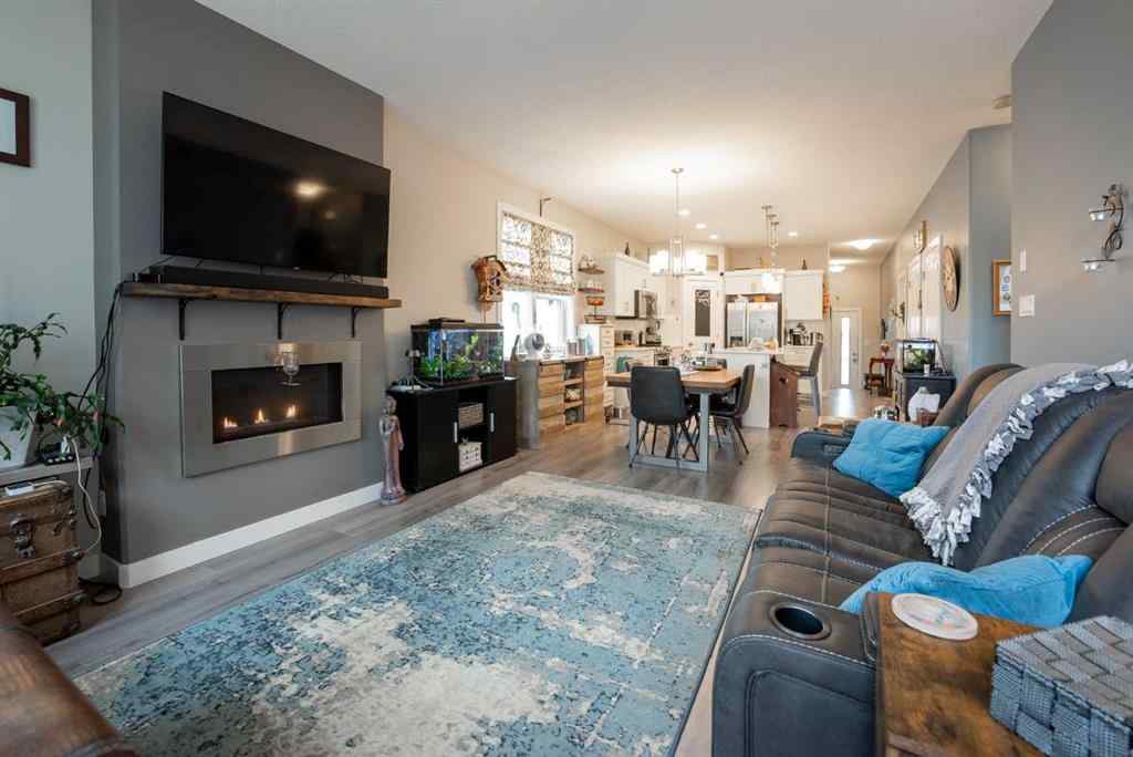 MLS® A2264593 - Unit #4 59 Aquitania Circle W in The Crossings Lethbridge, Residential