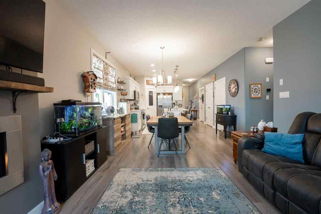 MLS® A2264593 - Unit #4 59 Aquitania Circle W in The Crossings Lethbridge, Residential