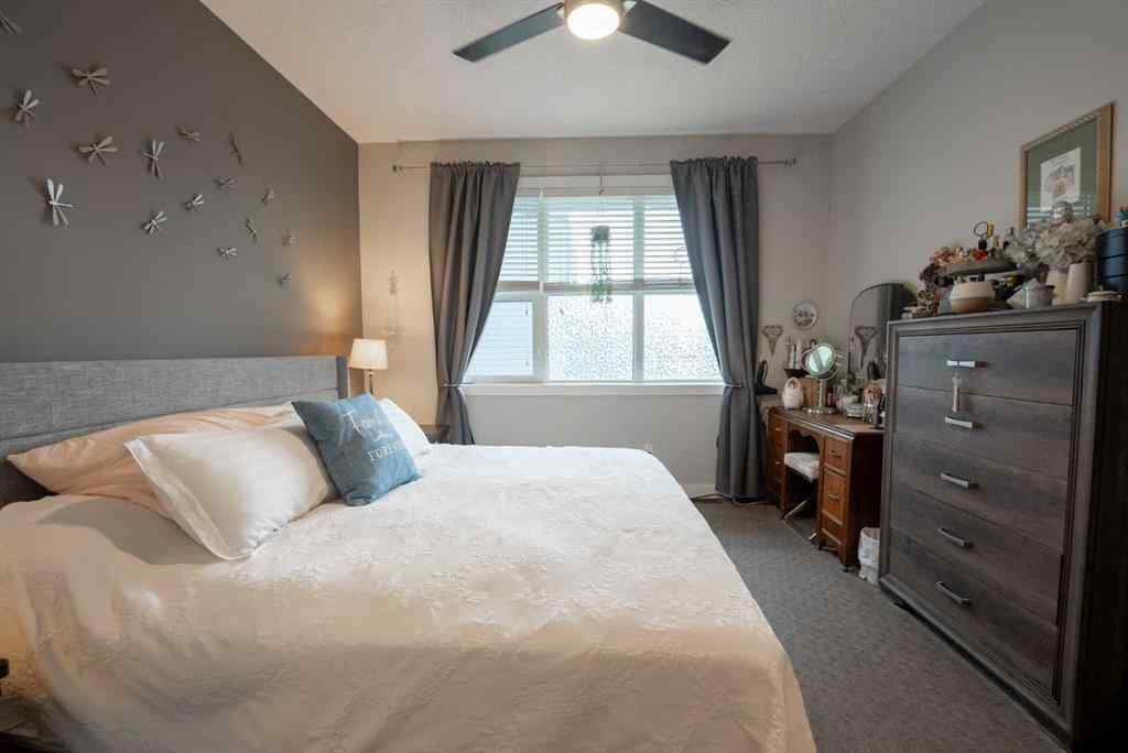 MLS® A2264593 - Unit #4 59 Aquitania Circle W in The Crossings Lethbridge, Residential