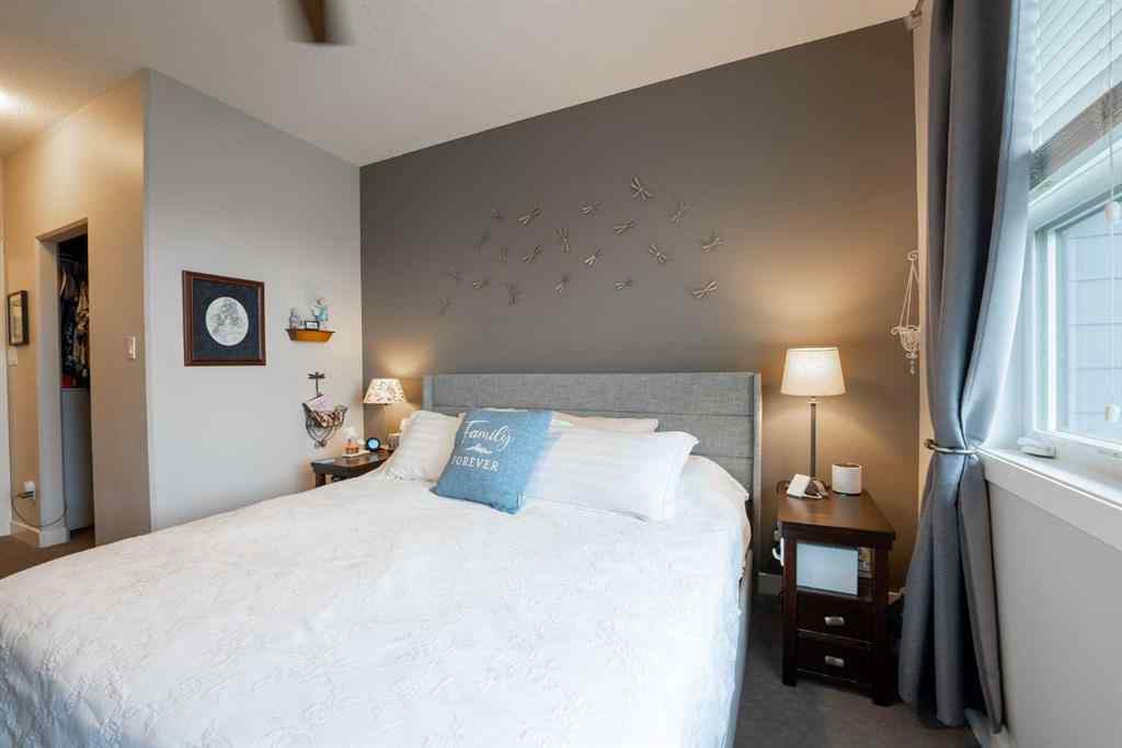 MLS® A2264593 - Unit #4 59 Aquitania Circle W in The Crossings Lethbridge, Residential