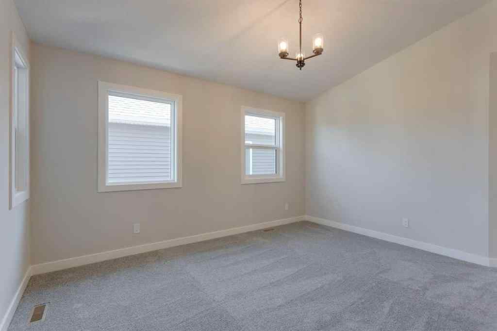 MLS® A2264613 - 11 Lewiston View NE in Lewisburg Calgary, Residential