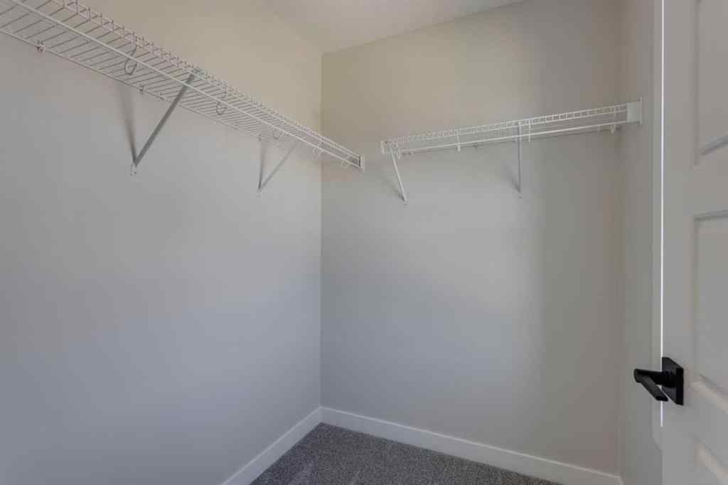 MLS® A2264613 - 11 Lewiston View NE in Lewisburg Calgary, Residential