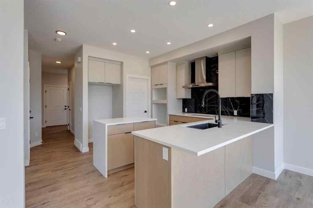 MLS® A2264613 - 11 Lewiston View NE in Lewisburg Calgary, Residential