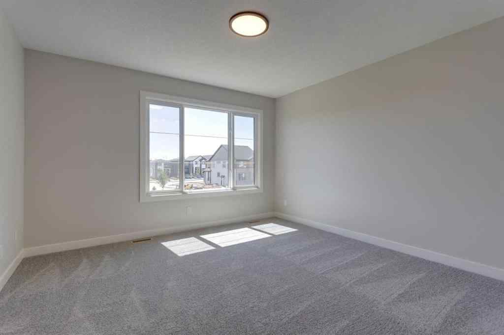 MLS® A2264613 - 11 Lewiston View NE in Lewisburg Calgary, Residential