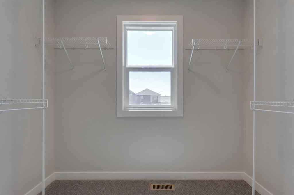 MLS® A2264613 - 11 Lewiston View NE in Lewisburg Calgary, Residential