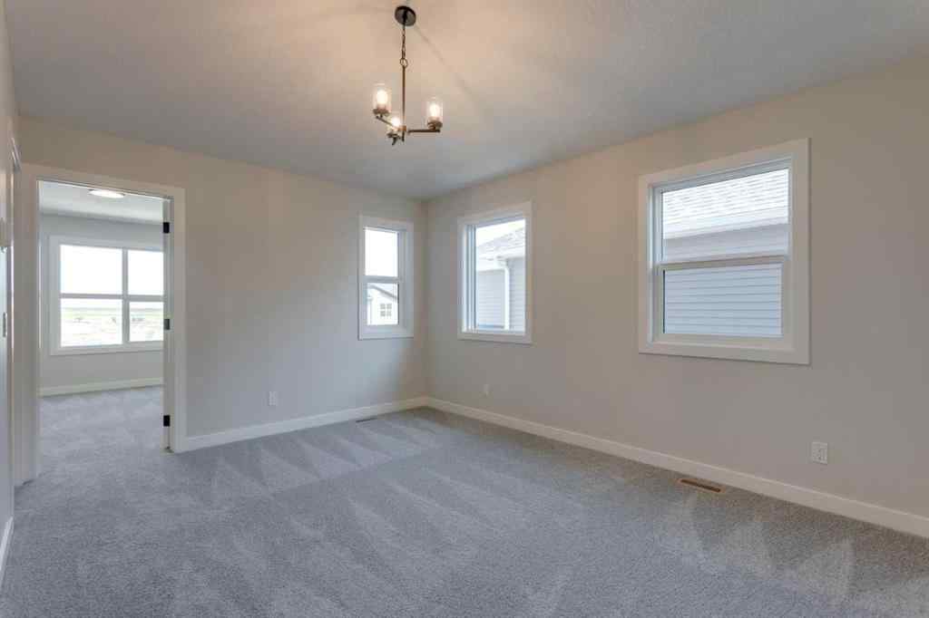 MLS® A2264613 - 11 Lewiston View NE in Lewisburg Calgary, Residential