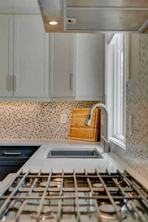 MLS® A2264619 - 2444 45 Street SE in Forest Lawn Calgary, Residential