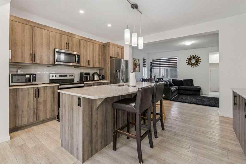 MLS® A2264624 - 223 Carrington Circle NW in Carrington Calgary, Residential