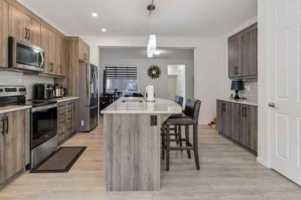 MLS® A2264624 - 223 Carrington Circle NW in Carrington Calgary, Residential