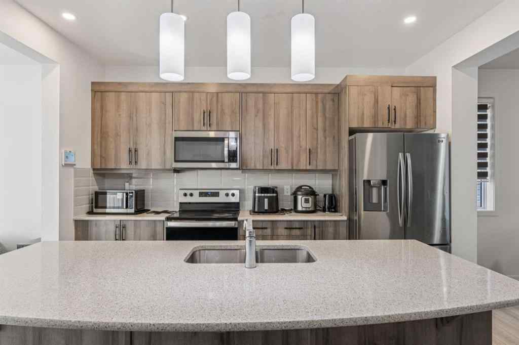 MLS® A2264624 - 223 Carrington Circle NW in Carrington Calgary, Residential