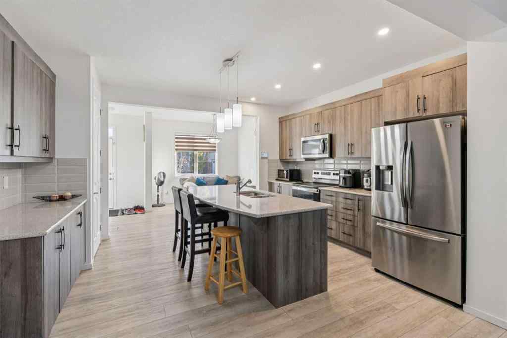 MLS® A2264624 - 223 Carrington Circle NW in Carrington Calgary, Residential