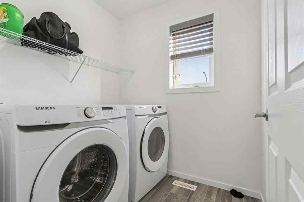 MLS® A2264624 - 223 Carrington Circle NW in Carrington Calgary, Residential