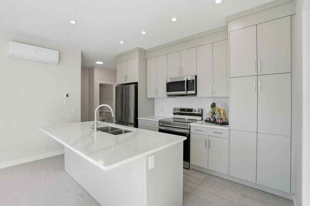 MLS® A2264631 - Unit #2417 2117 81 Street SW in Springbank Hill Calgary, Residential