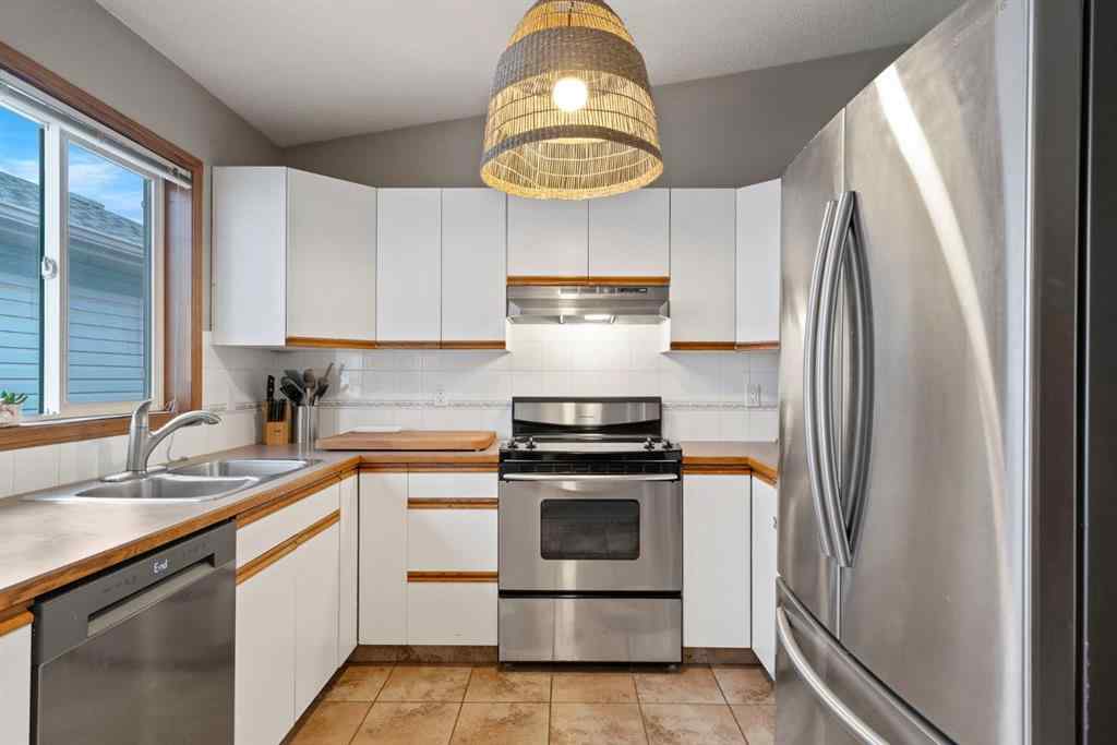 MLS® A2264639 - 132 Arbour Ridge Way NW in Arbour Lake Calgary, Residential