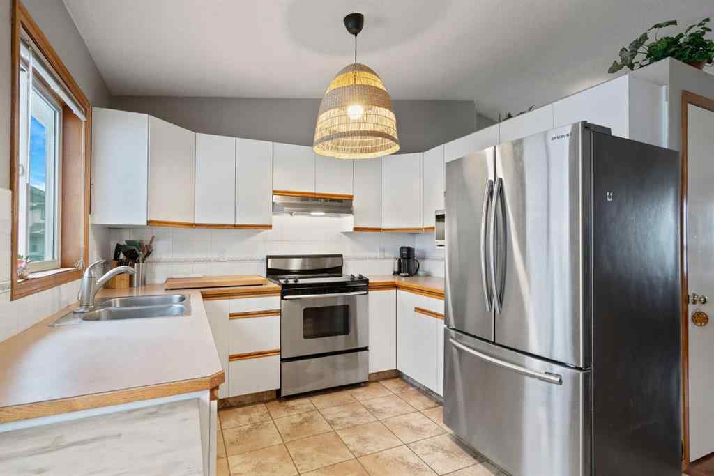 MLS® A2264639 - 132 Arbour Ridge Way NW in Arbour Lake Calgary, Residential