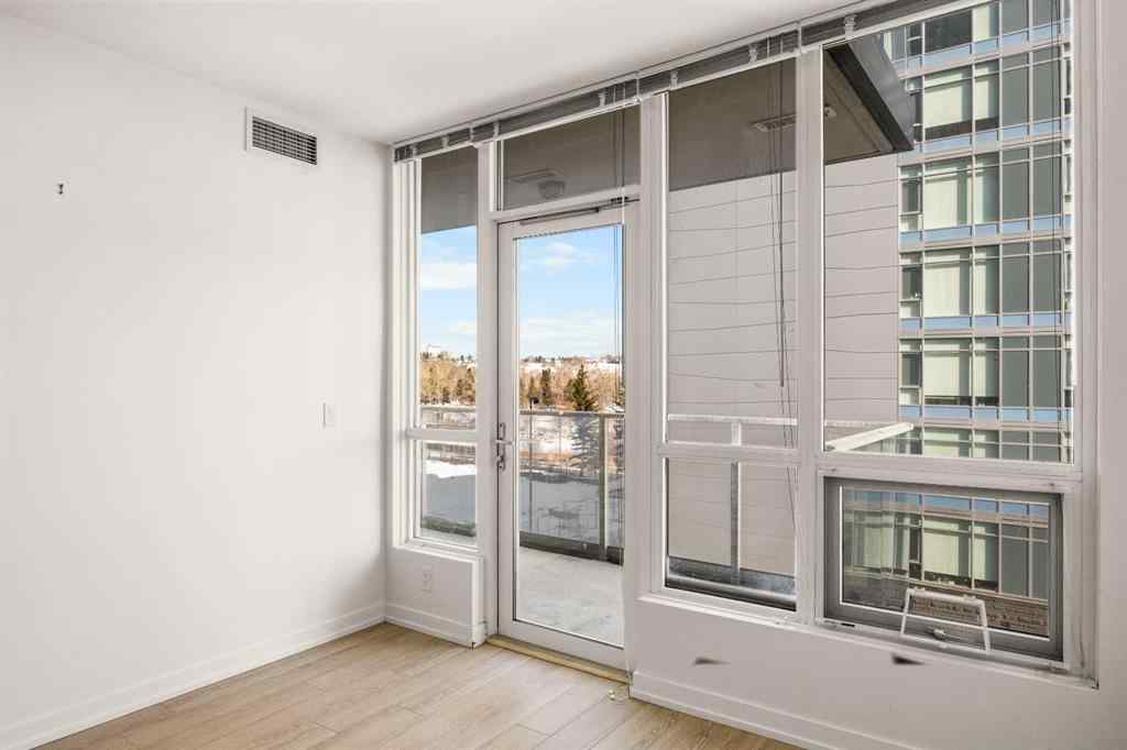 MLS® A2264645 - Unit #503 128 2 Street SW in Chinatown Calgary, Residential